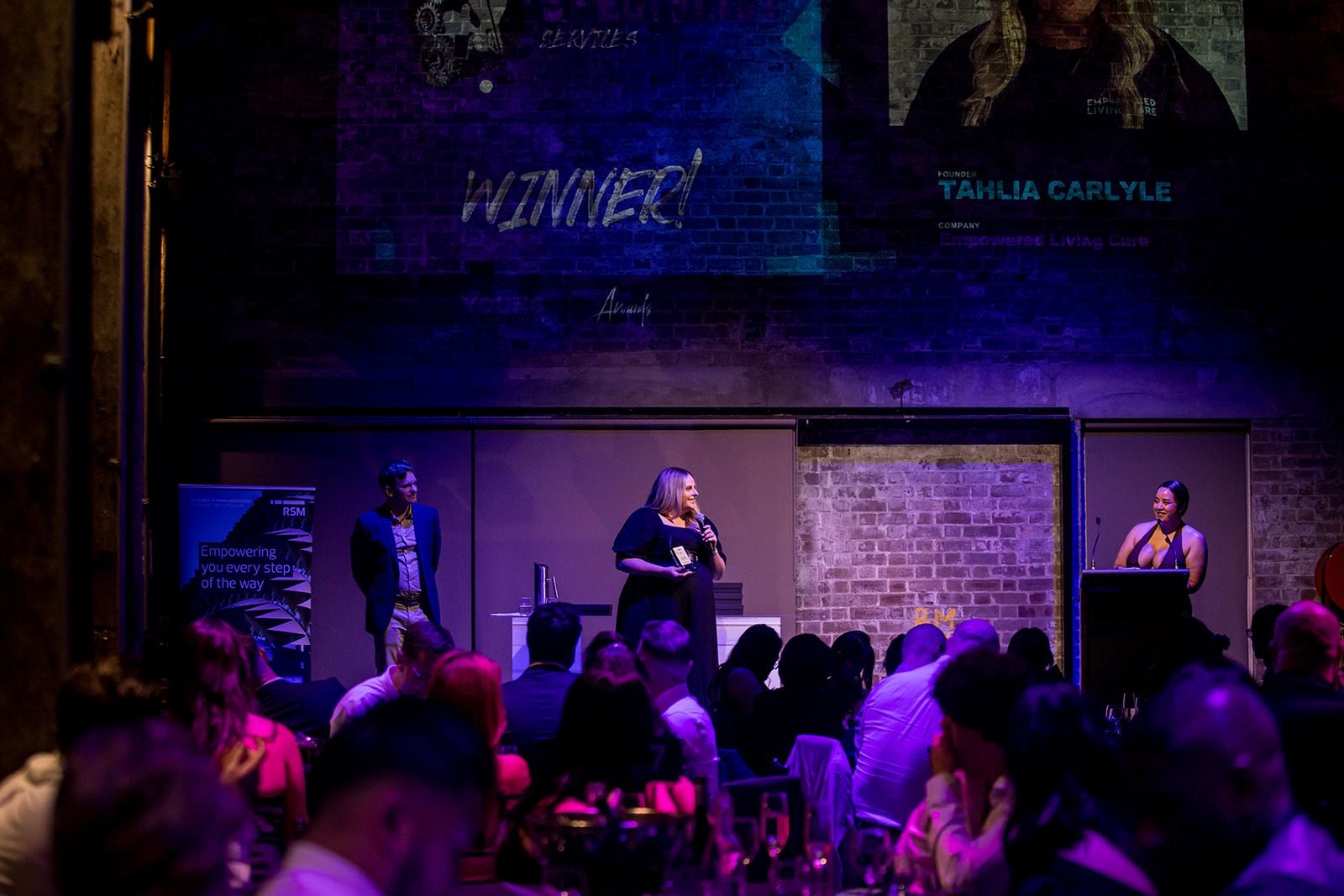 2025 Sydney Young Entrepreneur Awards Gala dinner Winners accepting trophies on stage at the 2025 Sydney Young Entrepreneur Awards